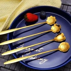 Fako Bijoux® - 4 Lange Lepels Bloem Motief - Latte Macchiato - Longdrink - Cocktail - Dessert - IJs - Koffie - Goud - 4 Stuks - Bewaarzakje -Merkloos Winkel 1200x1200 471